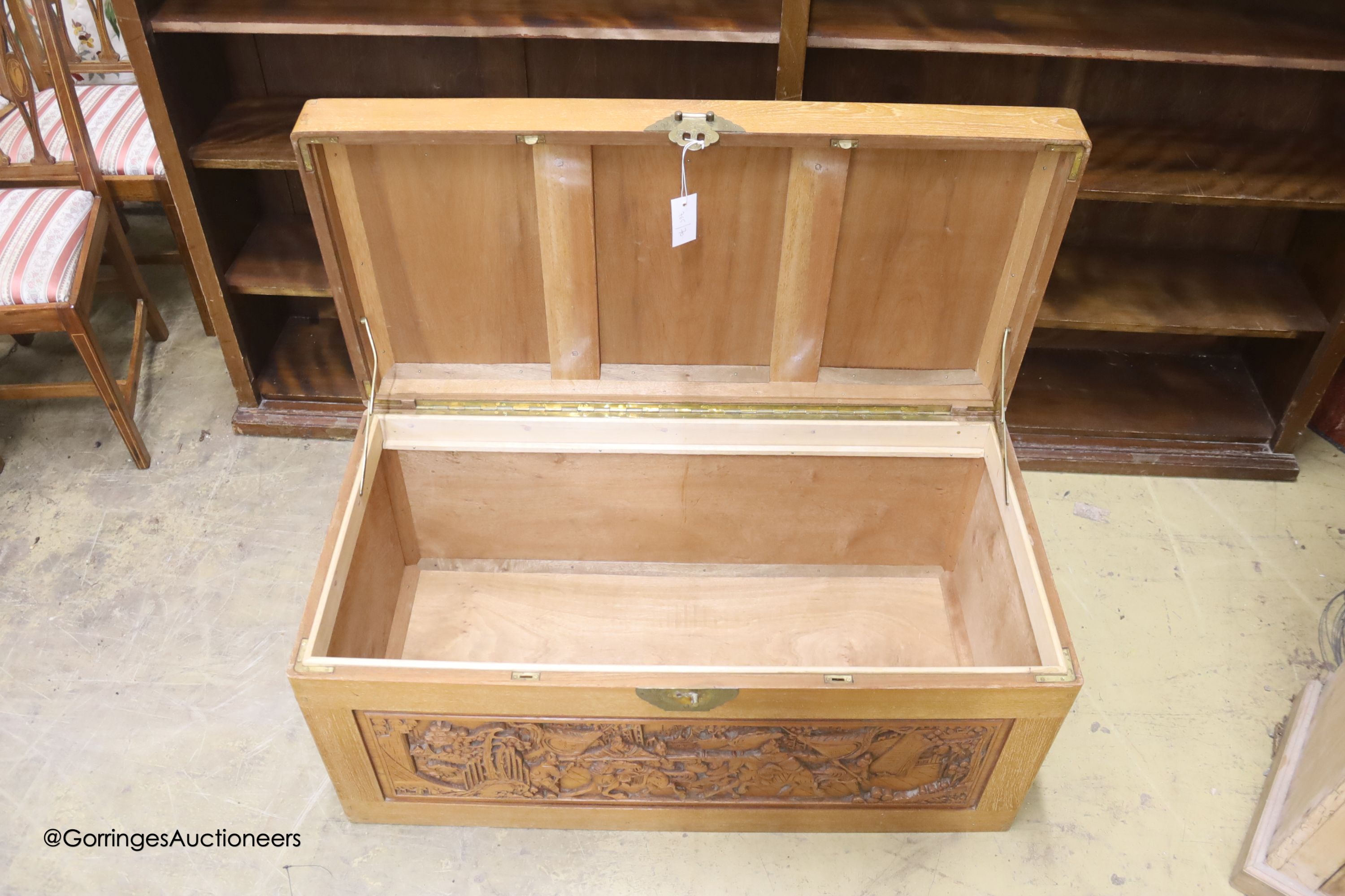 A Chinese carved camphorwood chest, length 100cm, depth 50cm, height 50cm